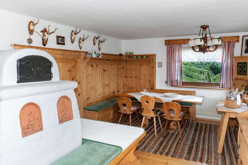 Parlor with oven in the Rossalm in Axams